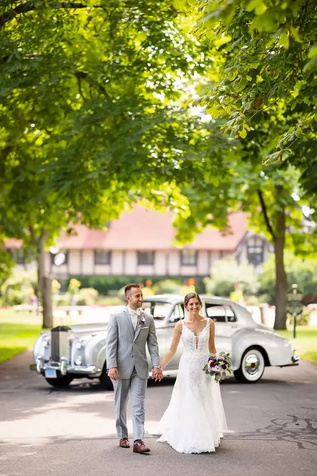 Bride and Groom with Vintage Wedding Car