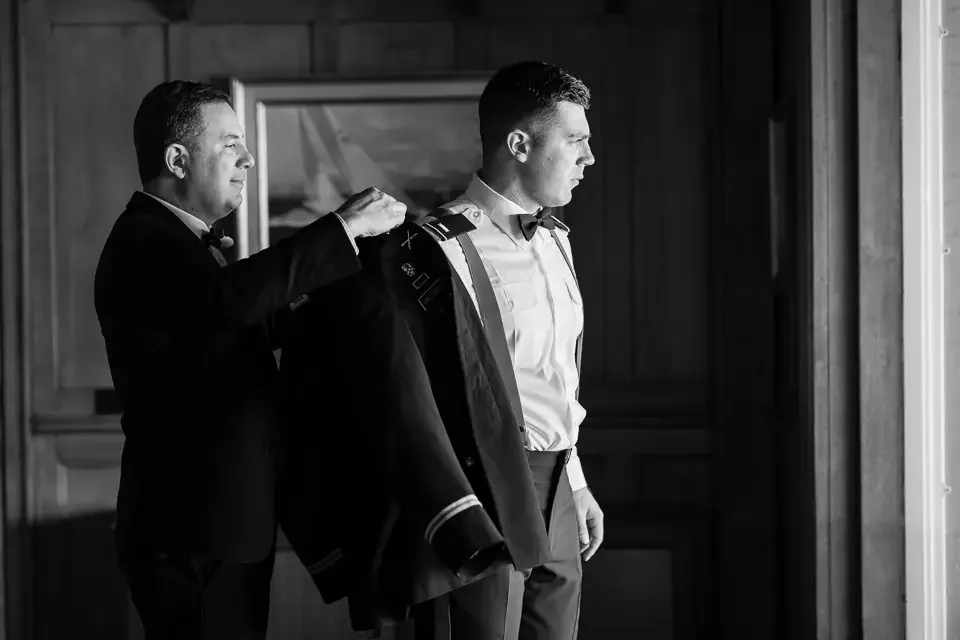 Father Helping Groom Get Ready