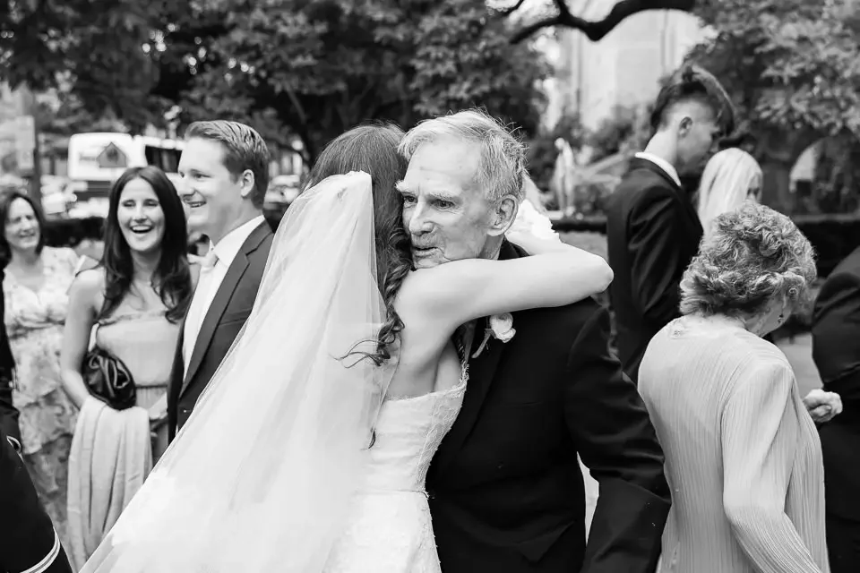 Bride Hugging Grandfather