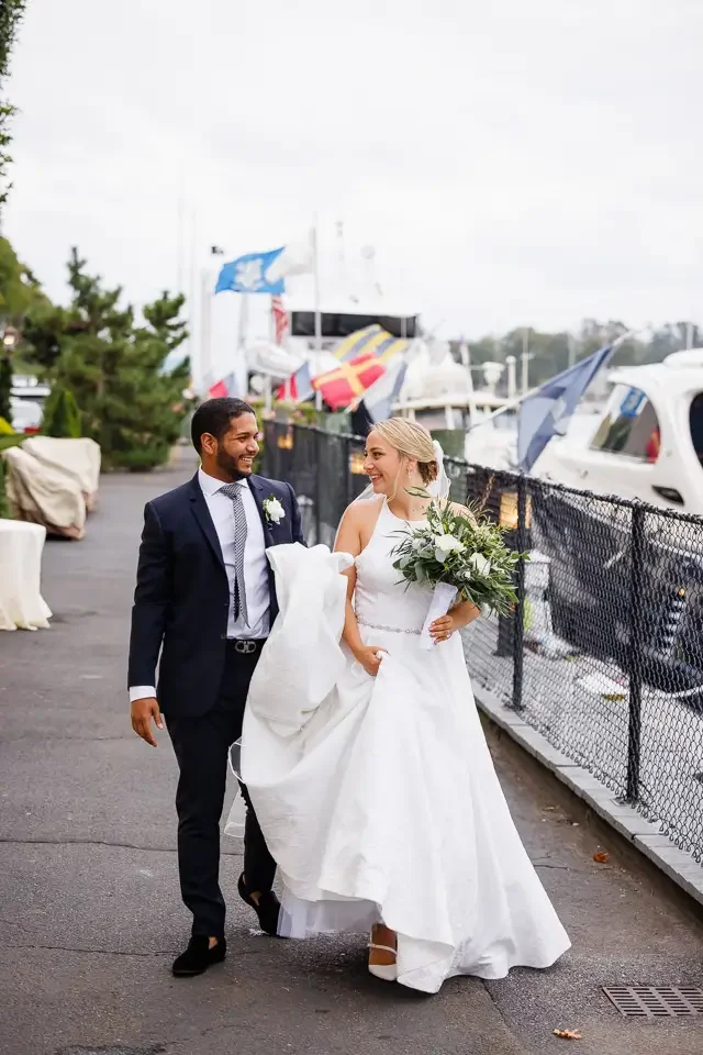 Bride and Groom Walking by the Marina
