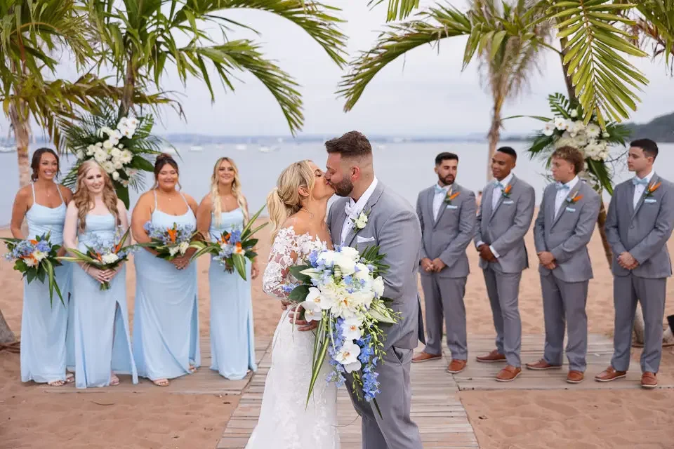 First Kiss Beneath the Palms
