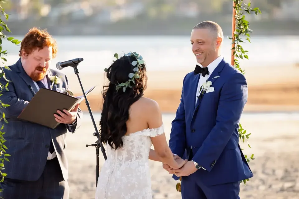 Exchanging Vows During a Beach Wedding Ceremony