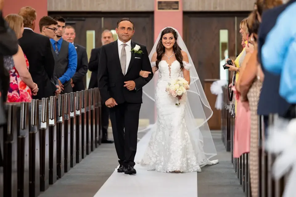 Bride Walking Down the Aisle with Her Father