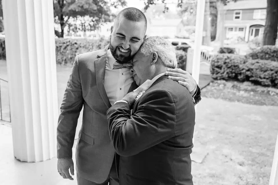 Emotional Groom and Father Wedding Moment