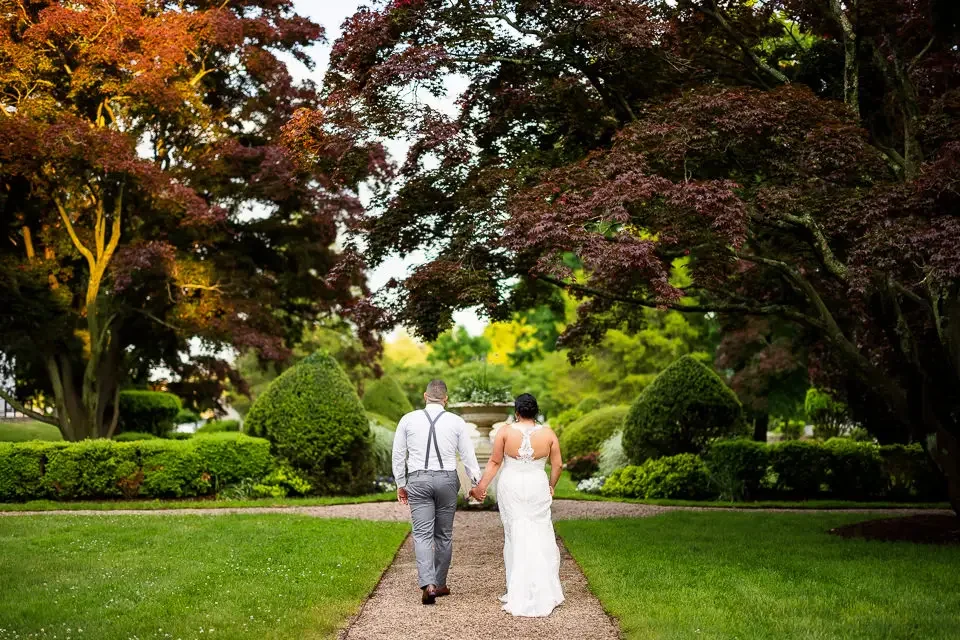 Garden Wedding Walk with Lush Greenery