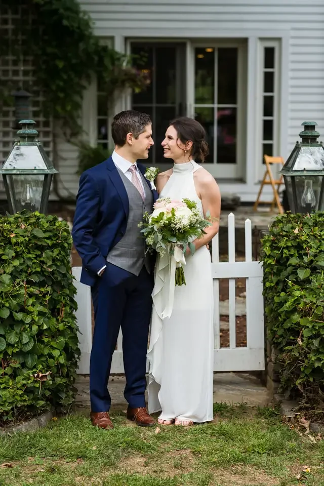 Romantic Outdoor Wedding Portrait with Lush Greenery