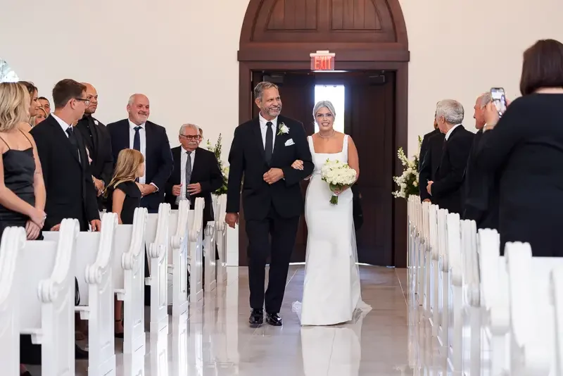 Bride Walking Down The Aisle With Father