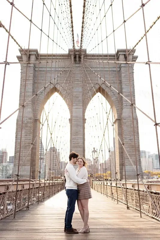 Romantic Engagement Moment On The Bridge