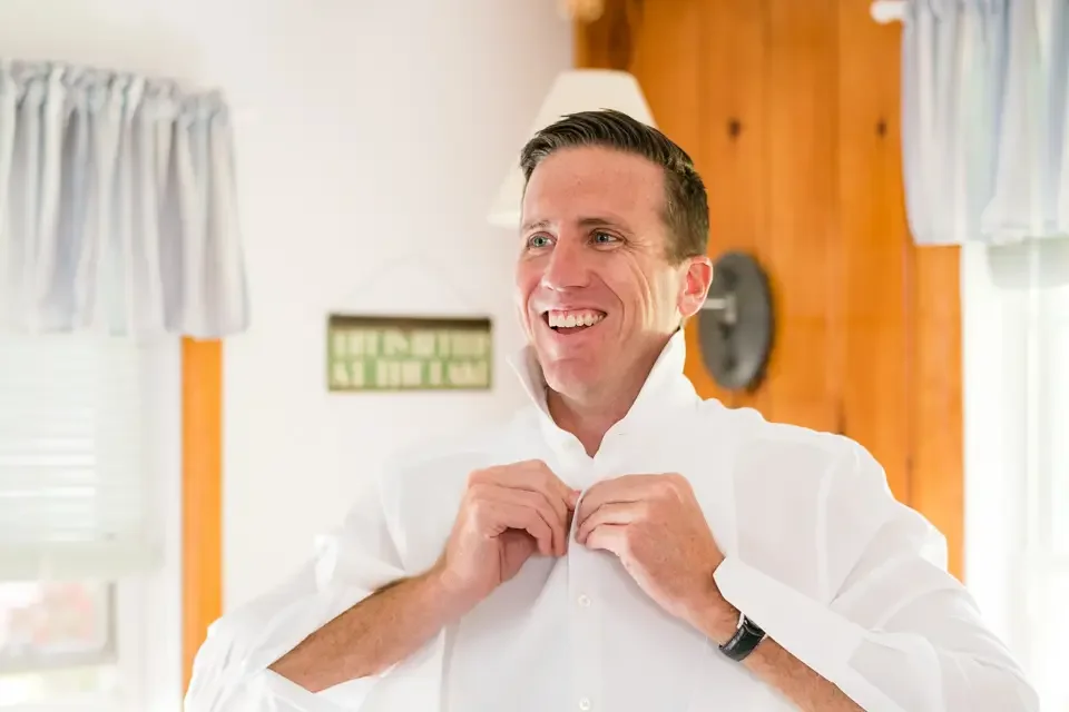 Joyful Groom Getting Ready Before the Ceremony