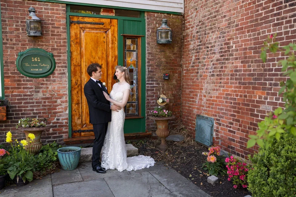 A Quiet Wedding Portrait Framed by Warm Brick and Natural Light