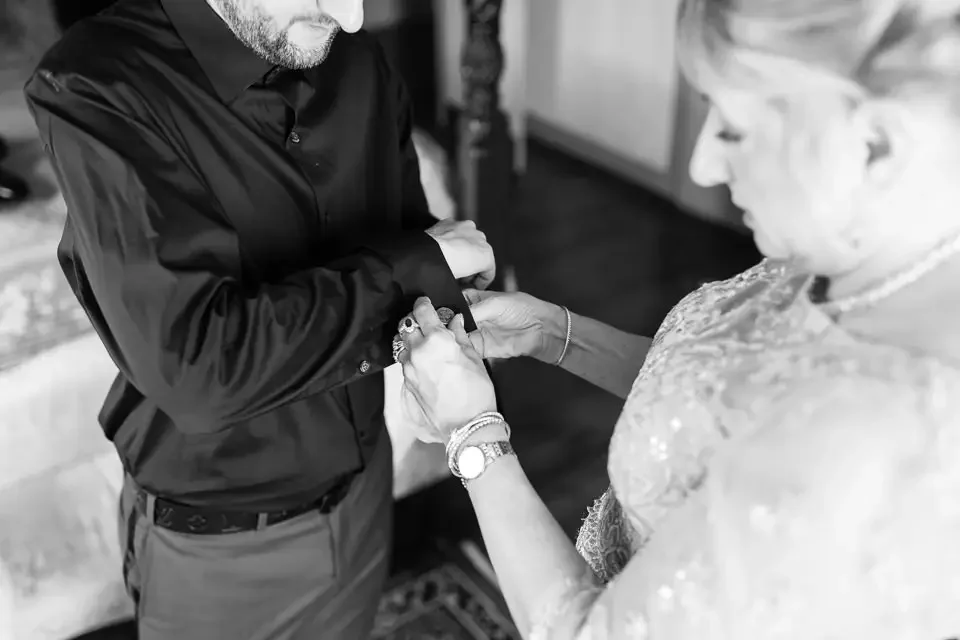 A Quiet Moment During Groom Preparations