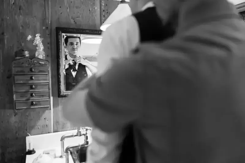 Groom Reflection Before Ceremony