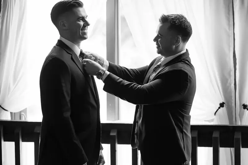 Best Man Helping Groom