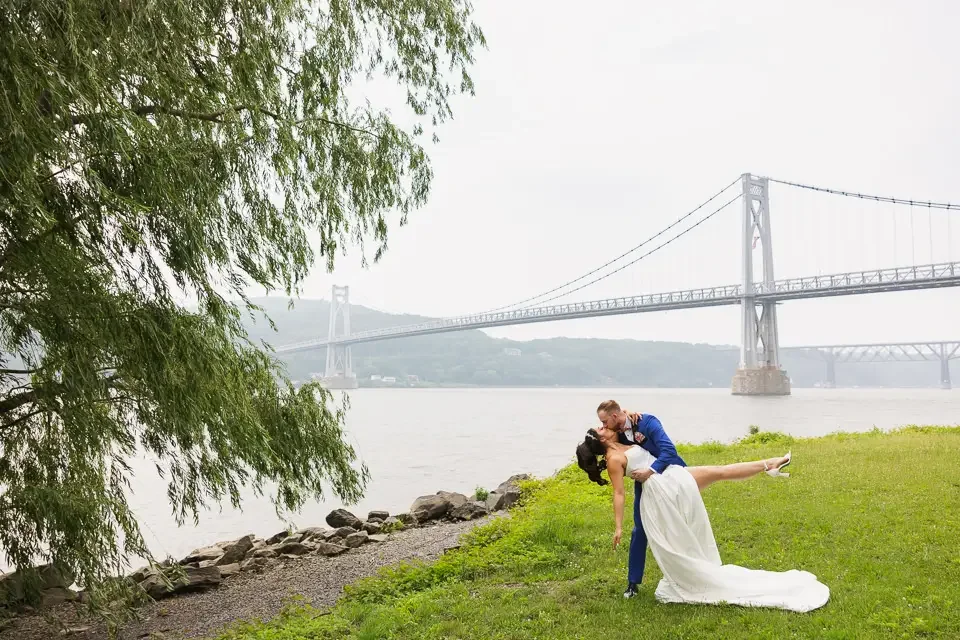 Dramatic Riverside Dip Kiss