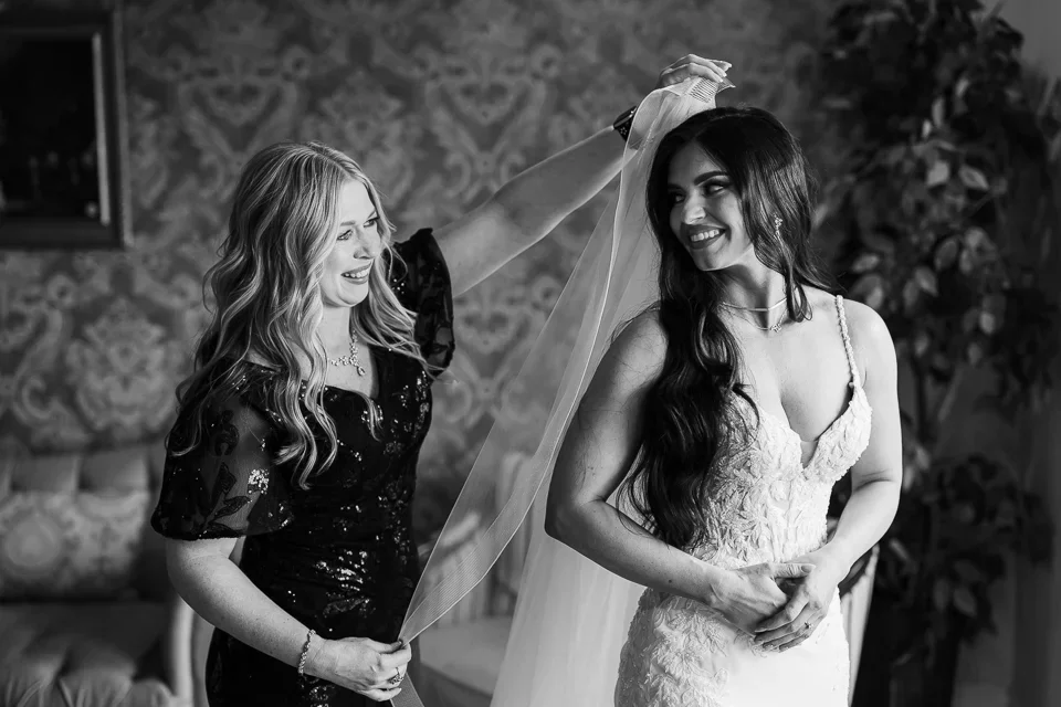 Bride Veil Moment with Bridesmaid