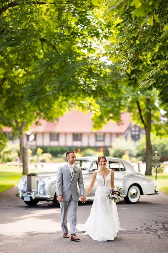 couple-holding-hands-walking-beneath-tree.jpg