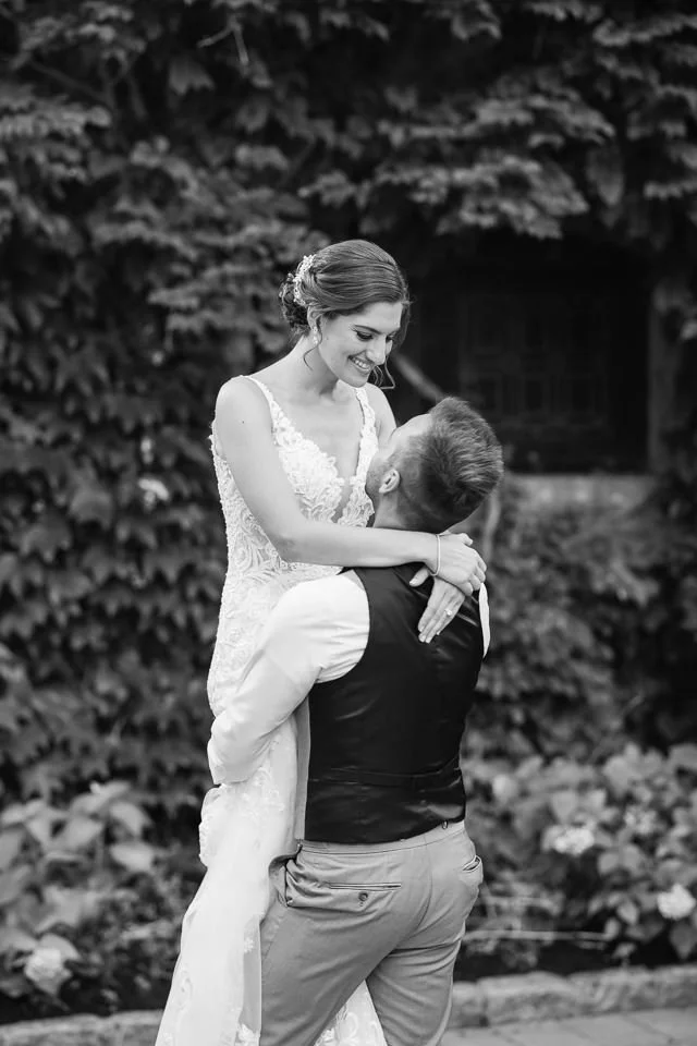 bride-beaded-white-dress-laughing-lifted.jpg