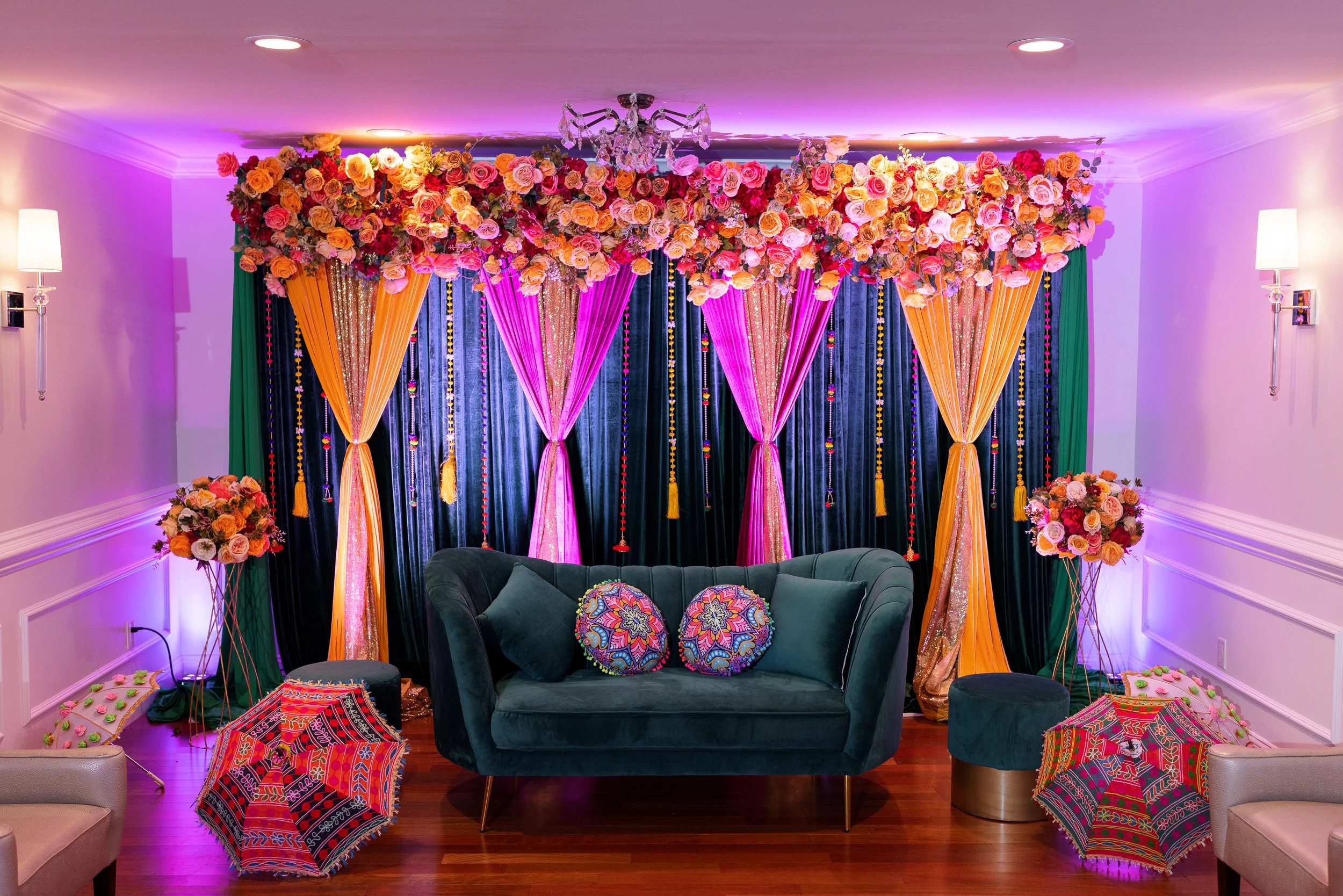 decorated-room-floral-arch-colorful-cushions.jpg