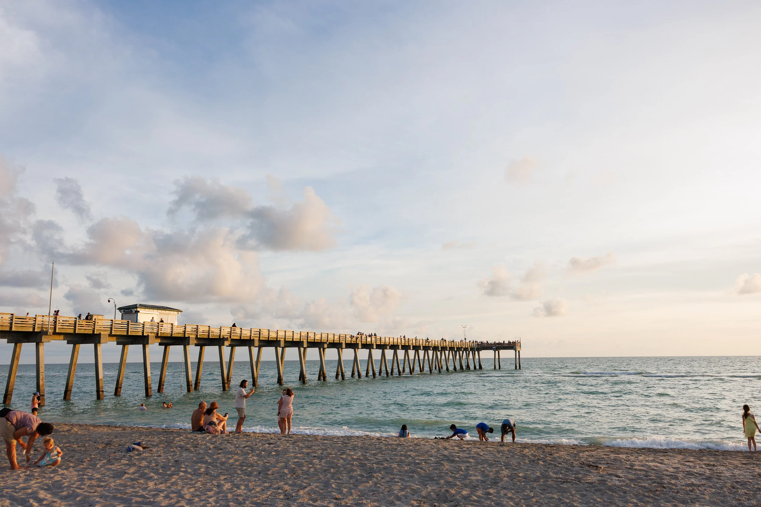 02-beach-scene-wooden-pier-water-sand.jpg