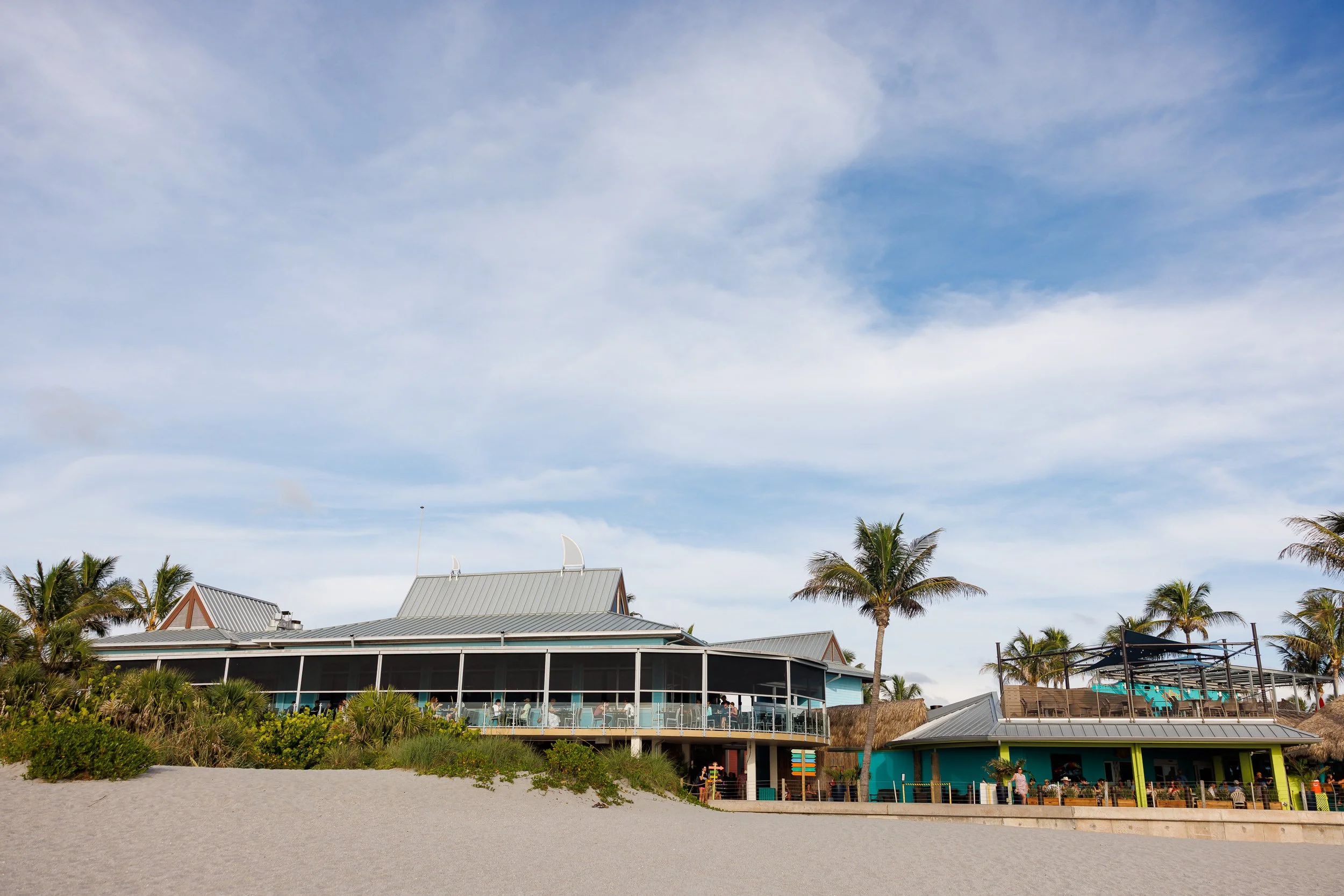 01-beach-venue-colorful-buildings-palm-trees.jpg