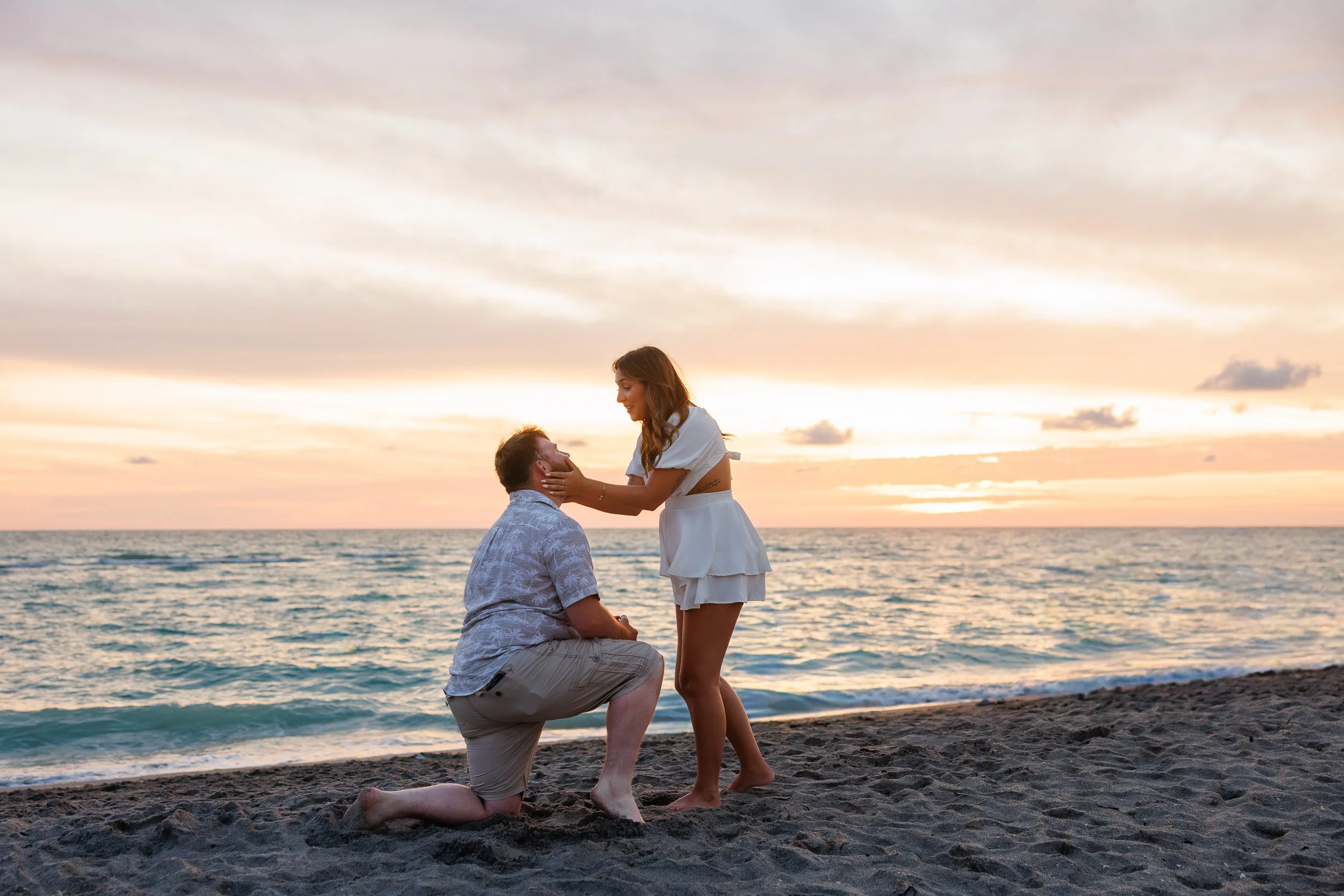 05-kneeling-sand-facing-standing-before-both.jpg