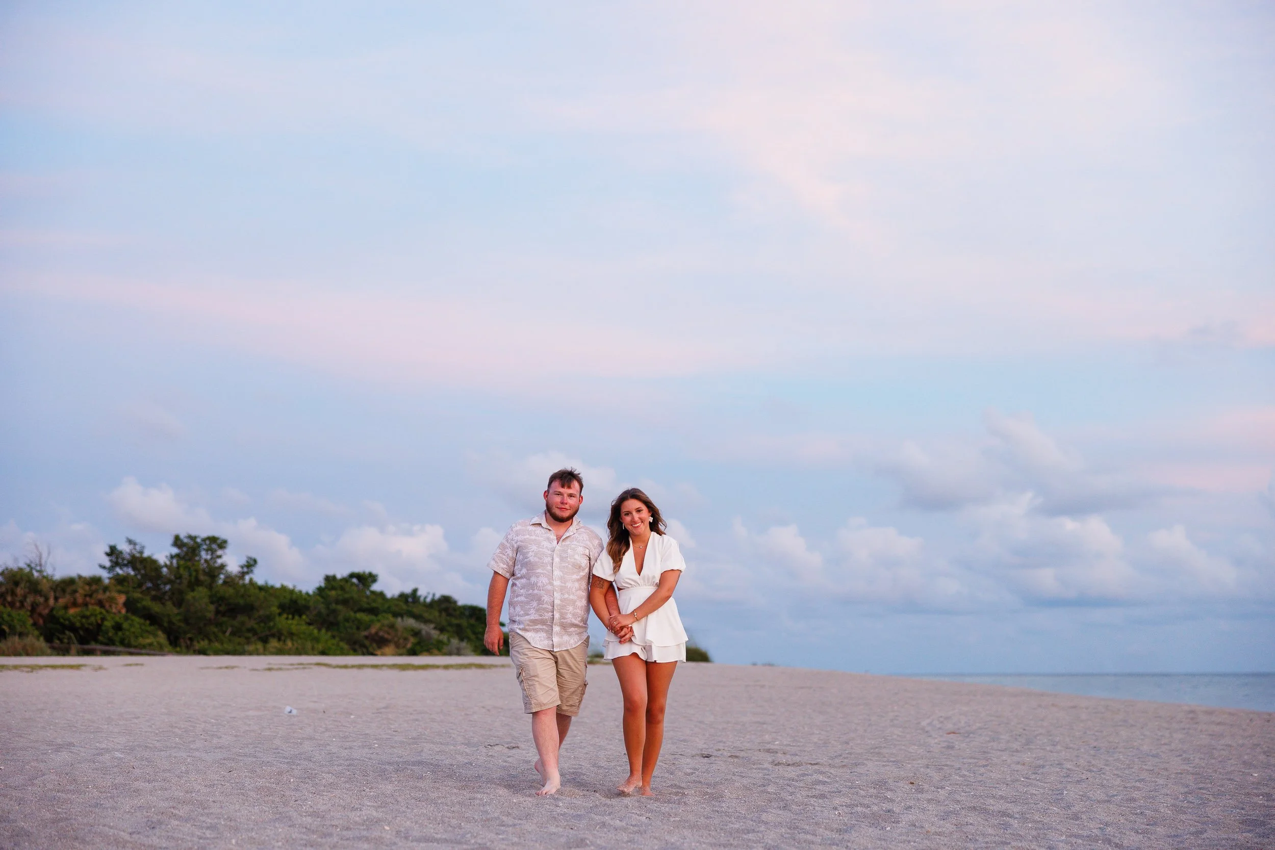 07-couple-holding-hands-walking-camera-empty.jpg