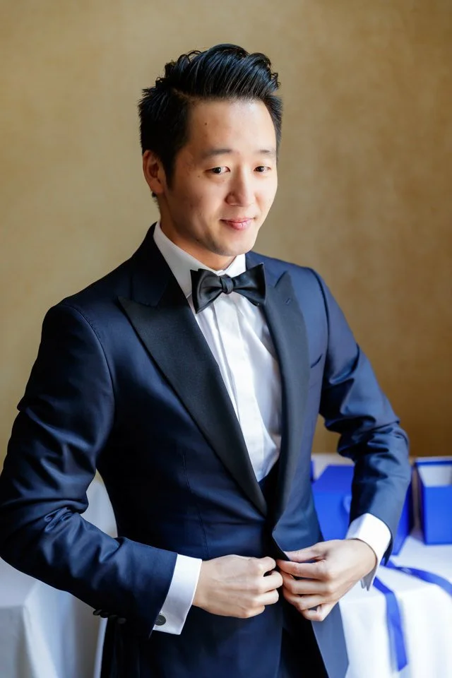 05-navy-tuxedo-bow-tie-looking-camera.jpg