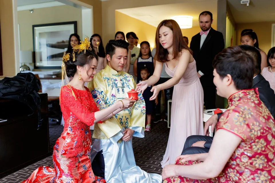 13-red-embroidered-dress-kneels-before-seated.jpg