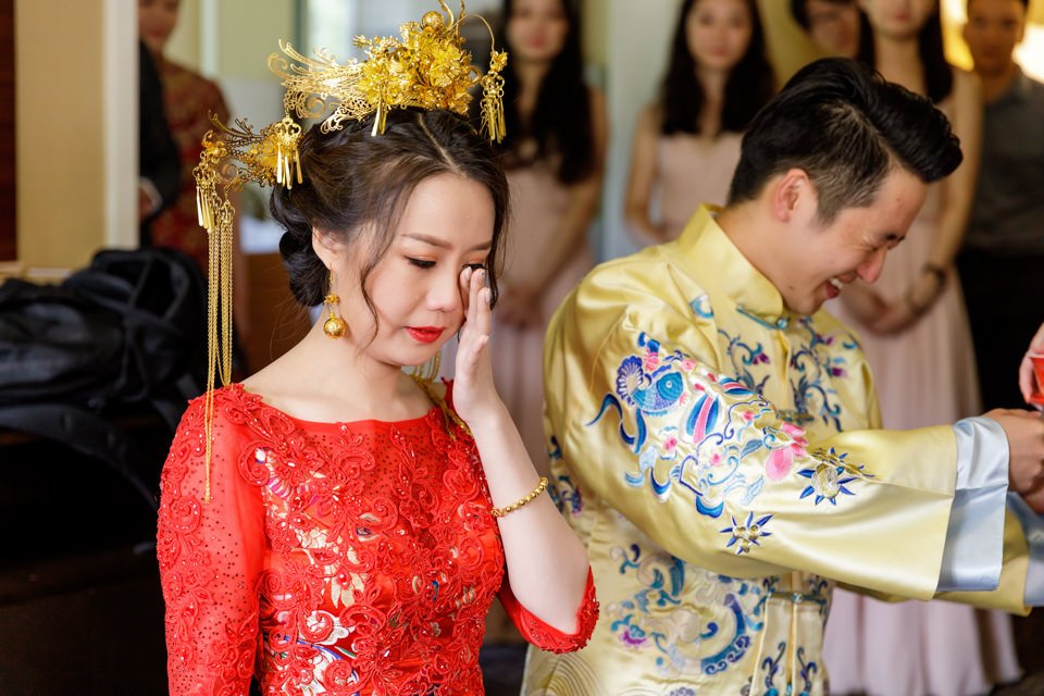 17-elaborate-traditional-dress-guests-standing-behind.jpg