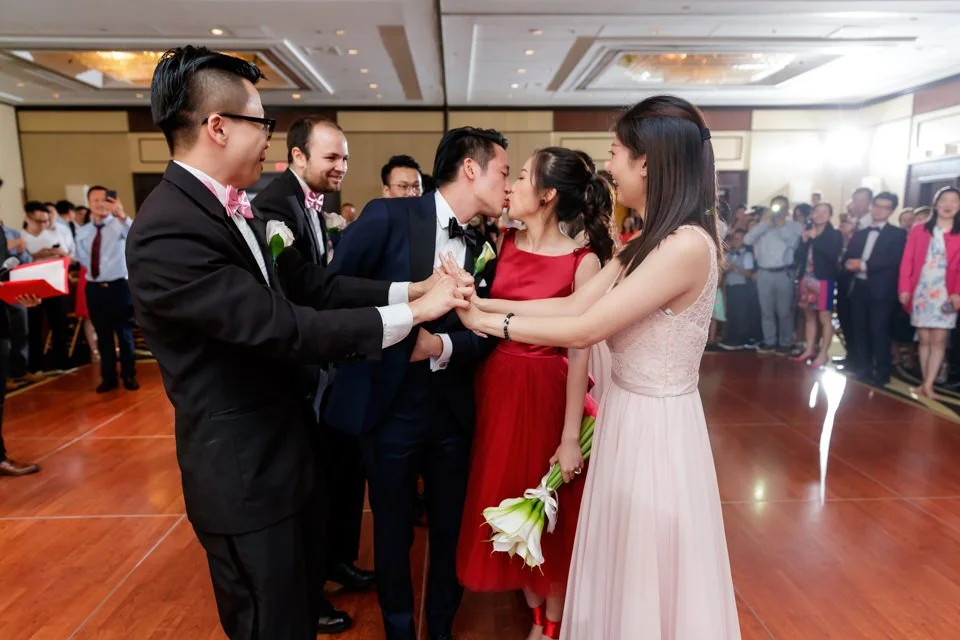 25-couple-formal-attire-dancing-guests-surrounding.jpg