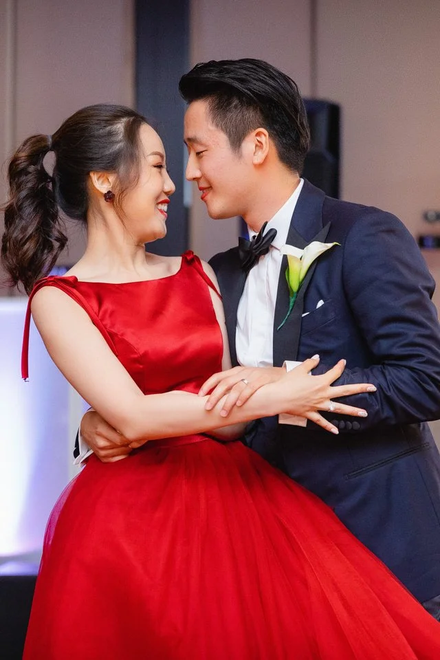 29-couple-formal-attire-facing-smiling-indoor.jpg