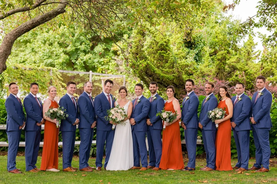 14-wedding-party-sixteen-standing-line-lawn.jpg