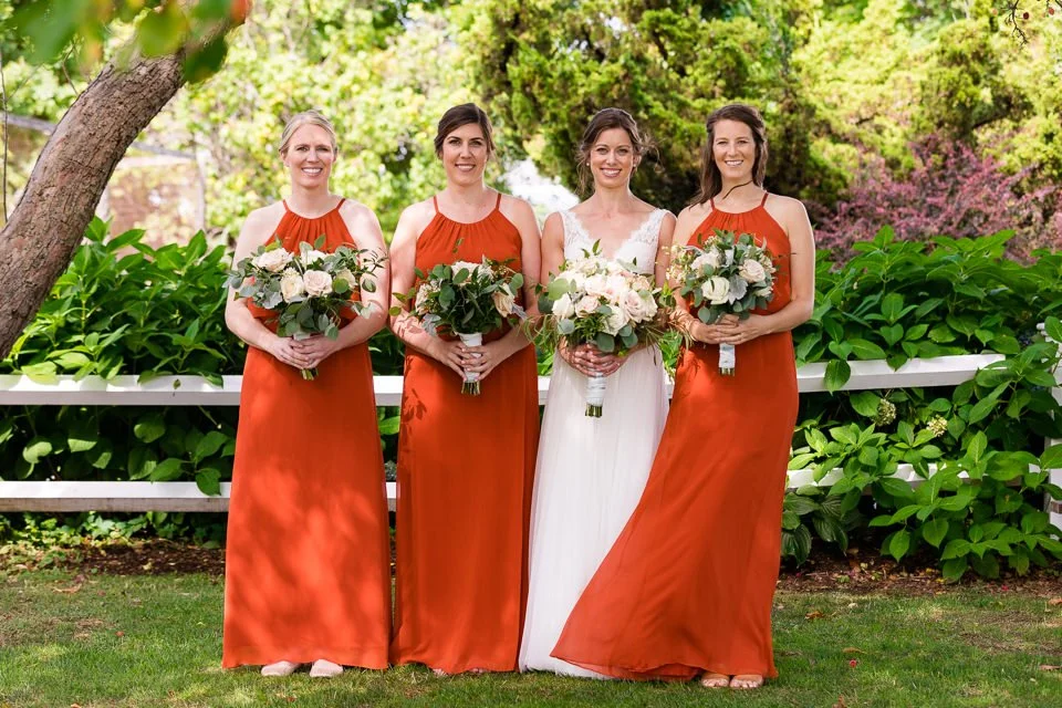 21-four-red-white-dresses-holding-bouquets.jpg