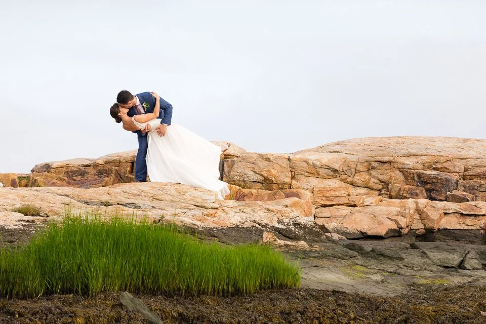 23-couple-dancing-rocky-coastal-ledge-bride.jpg