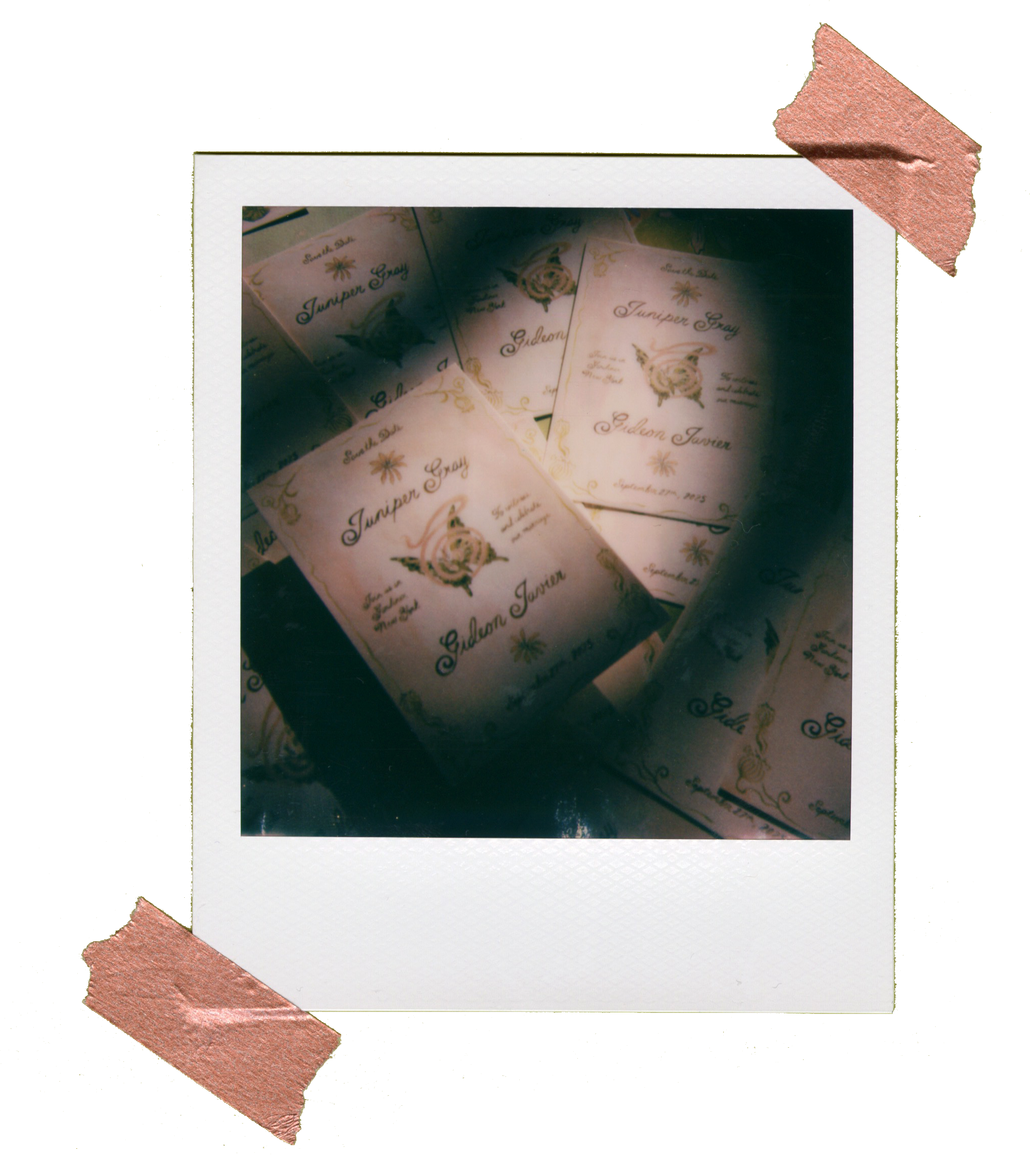 Polaroid photo of several wedding invitations for Sidelan Javen and Juniper Gray, decorated with floral and star motifs, in soft pastel colors.
