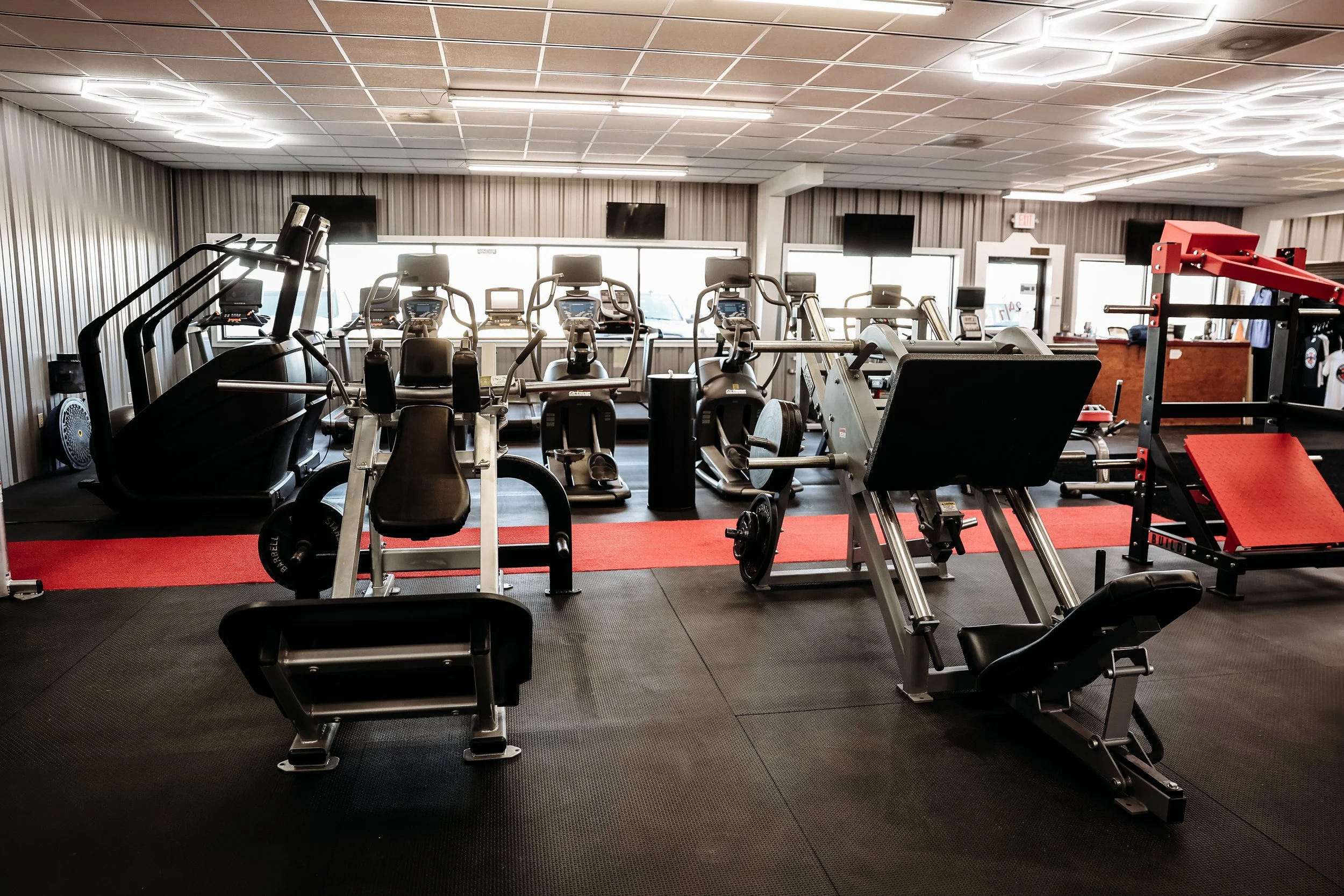 We have various cardio and strength training equipment, including treadmills, ellipticals, and weight machines.