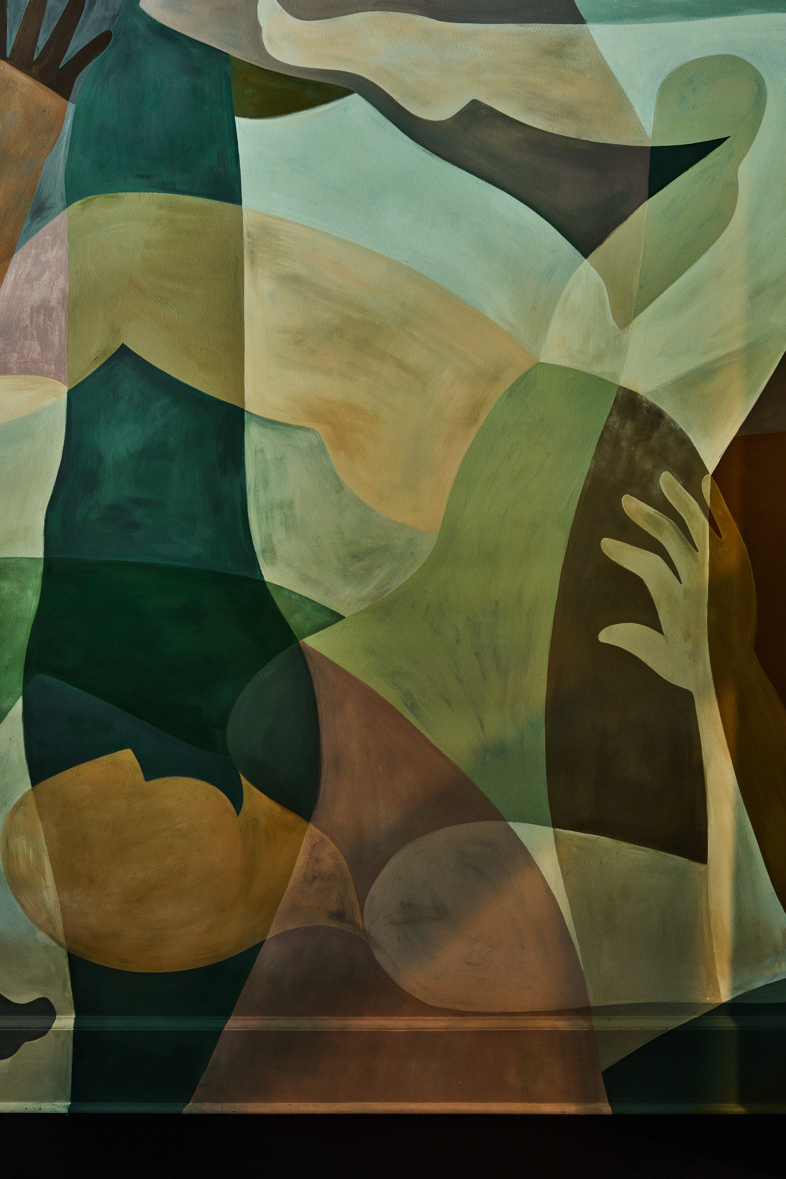 Abstract painting with overlapping organic shapes in shades of green, yellow, beige, and dark brown.