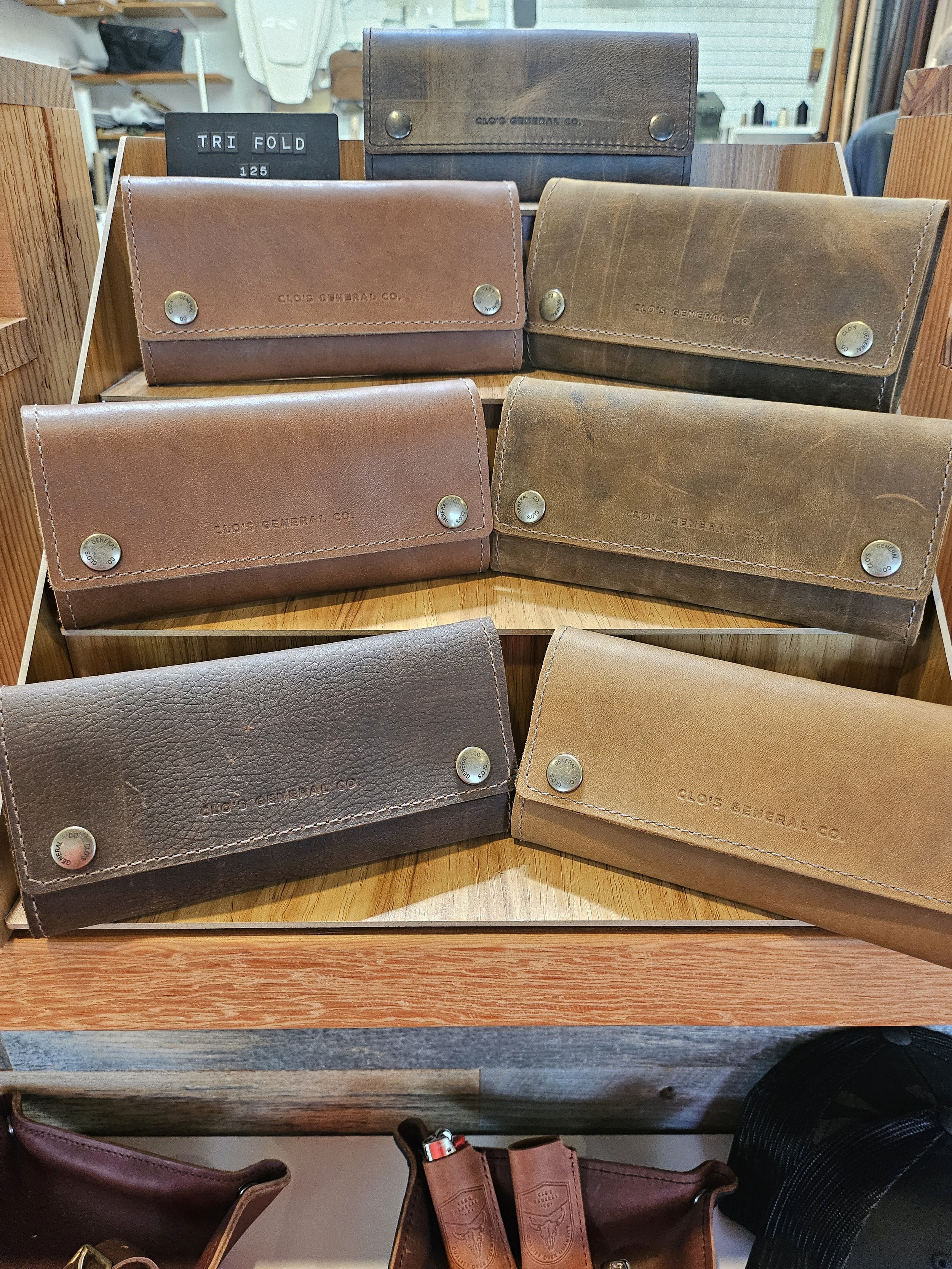 Wallets with custom metal snap engraving
