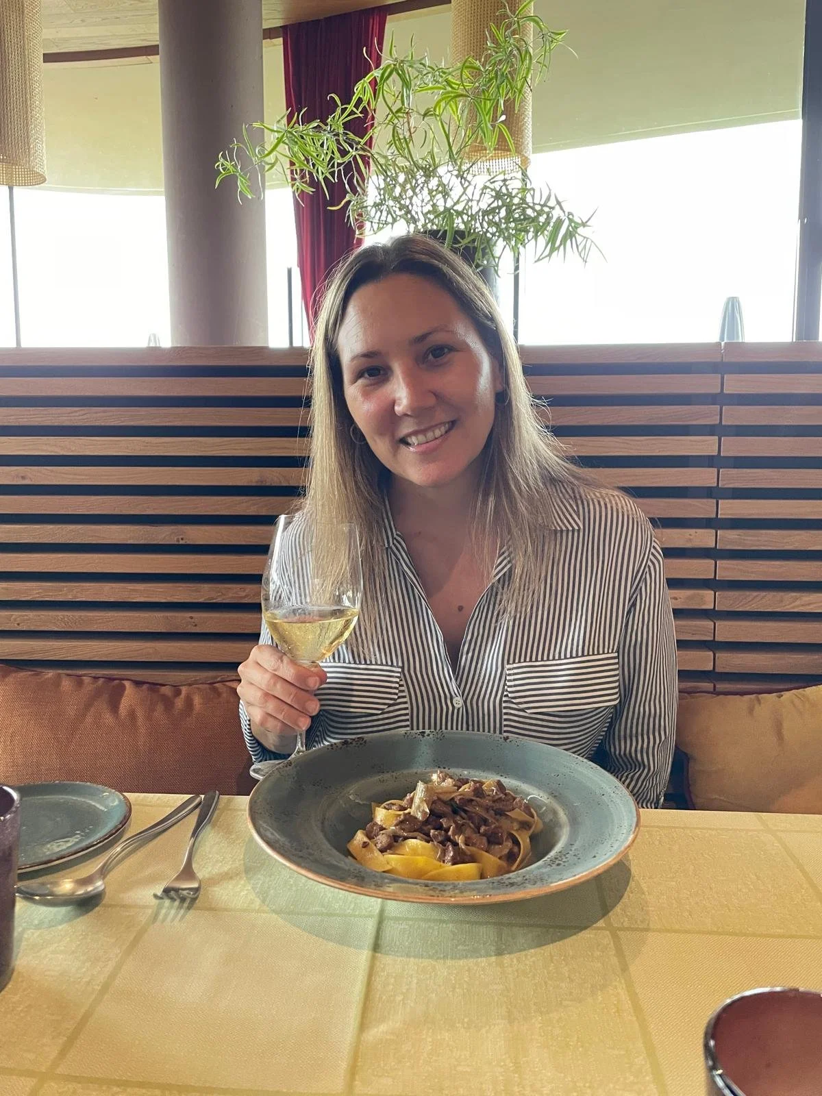 Host enjoying local Tuscan food and wine