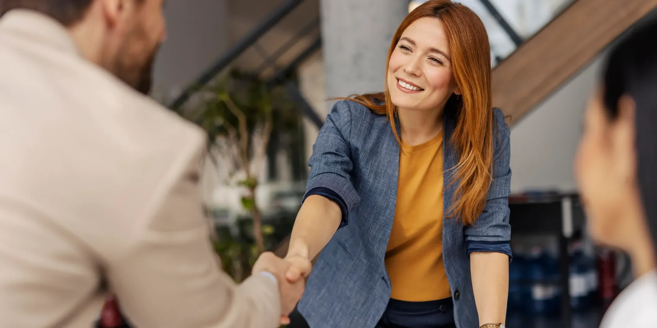 newly qualified surrogate shaking hands
