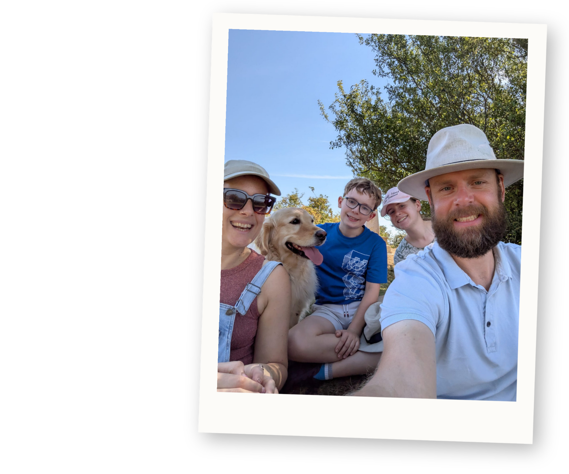 Family enjoying a sunny day together outdoors.