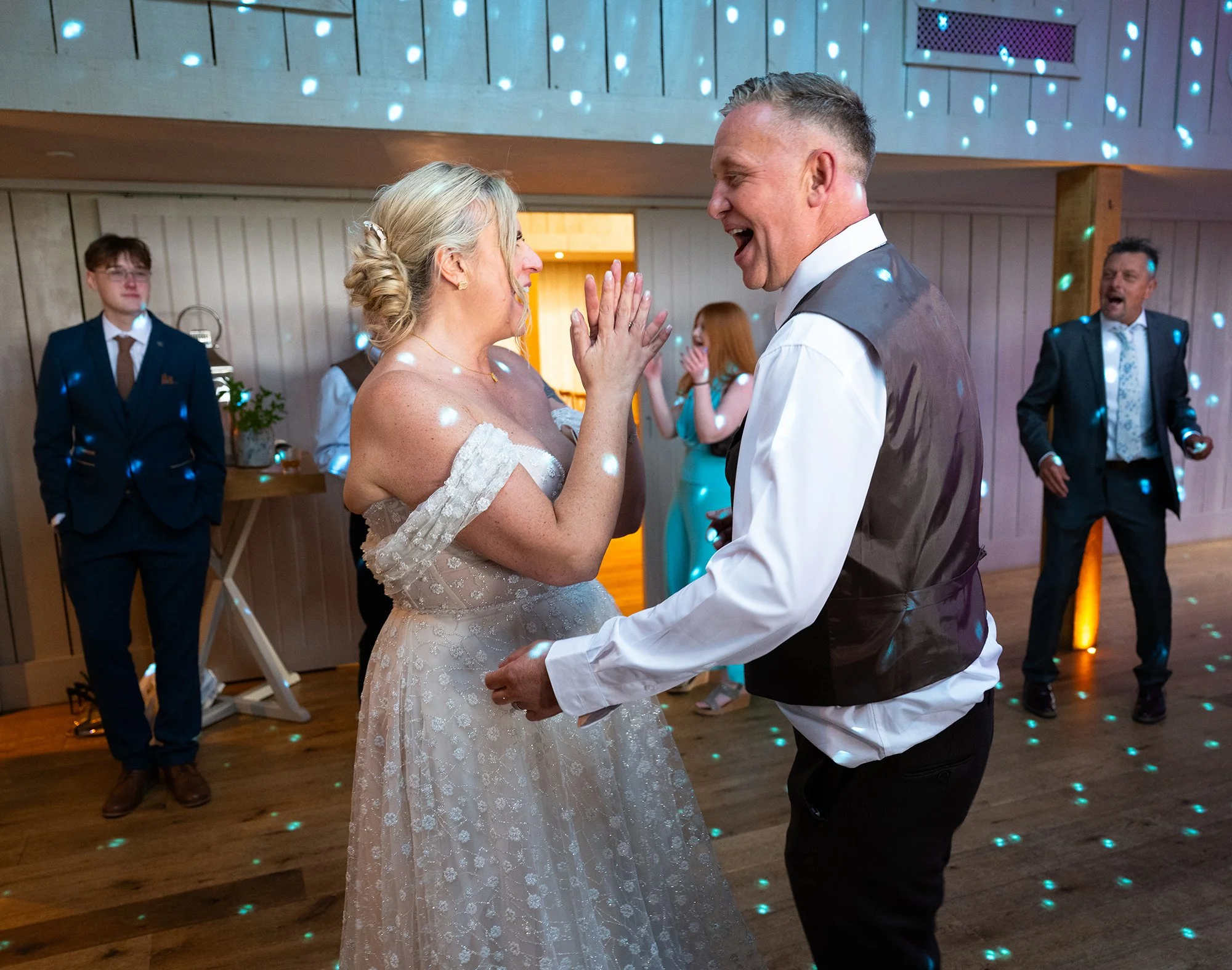 bride and groom dancing at their wedding