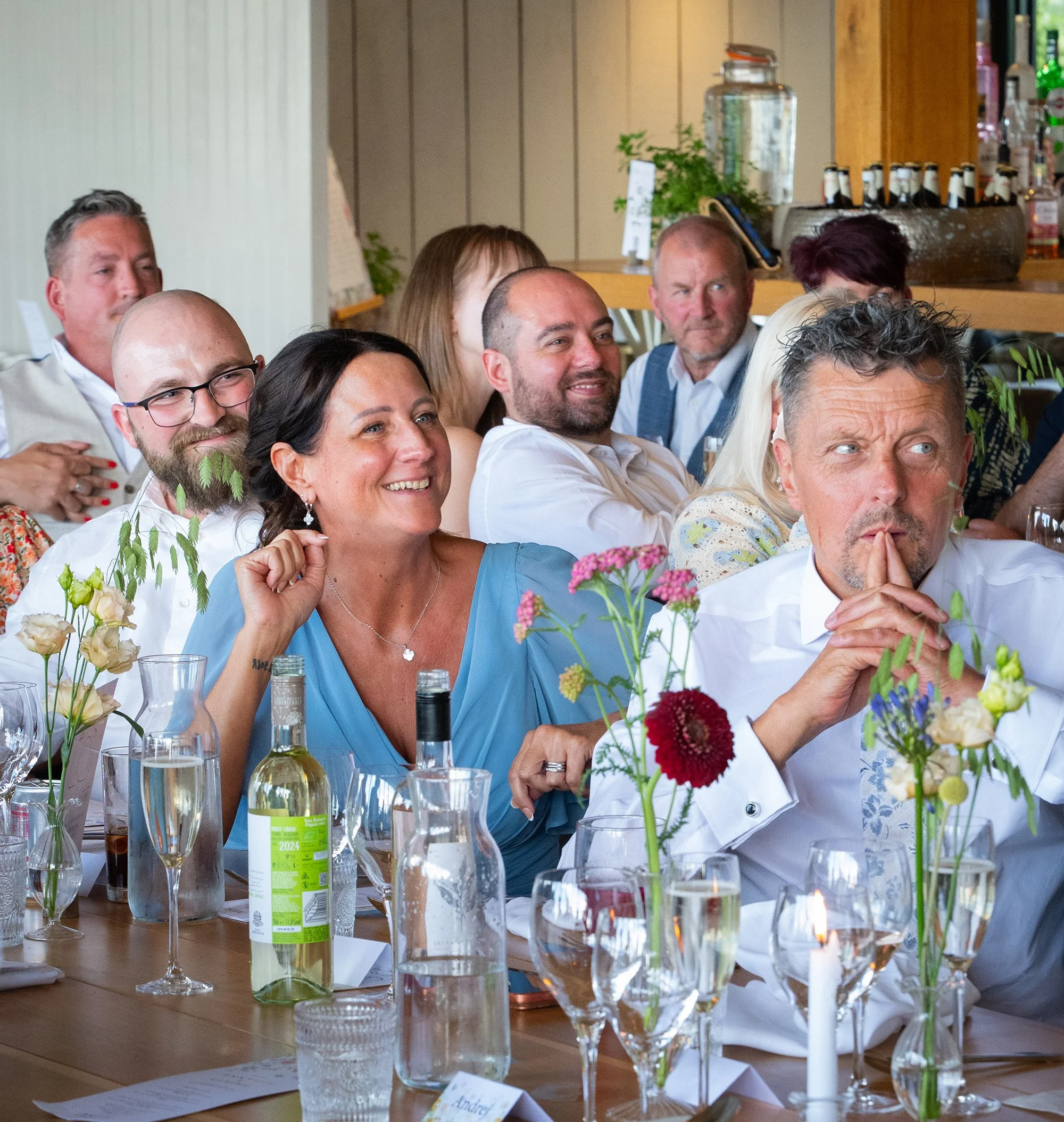 wedding guests listening to speeches