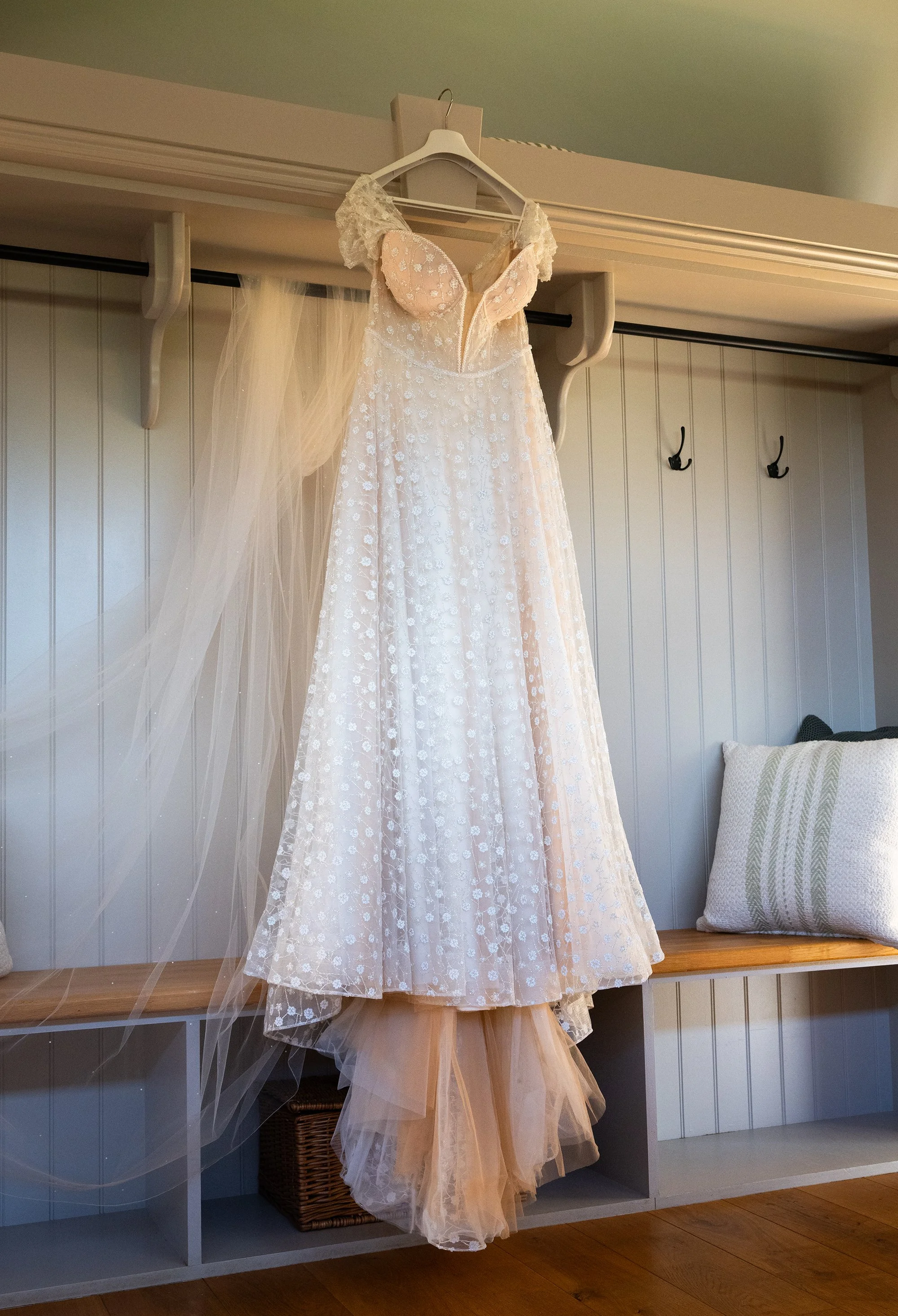 Wedding dress hanging ready before the ceremony.