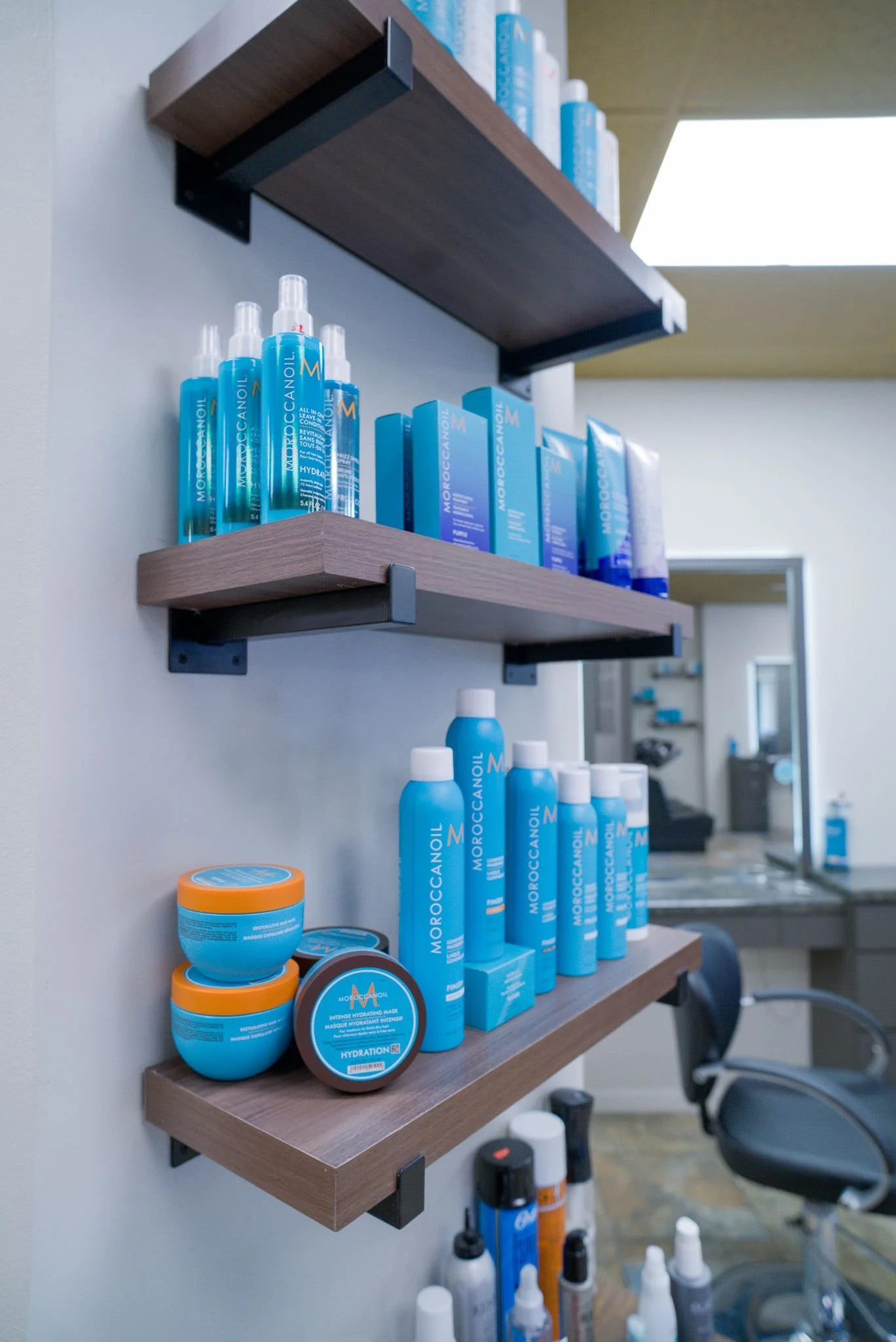 Professional Moroccanoil hair care products available at Willow's Cove Salon, luxury salon in Mineola NY