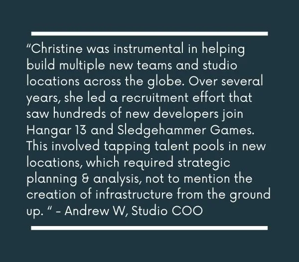 A view of the Golden Gate Bridge partially shrouded in fog over San Francisco Bay.