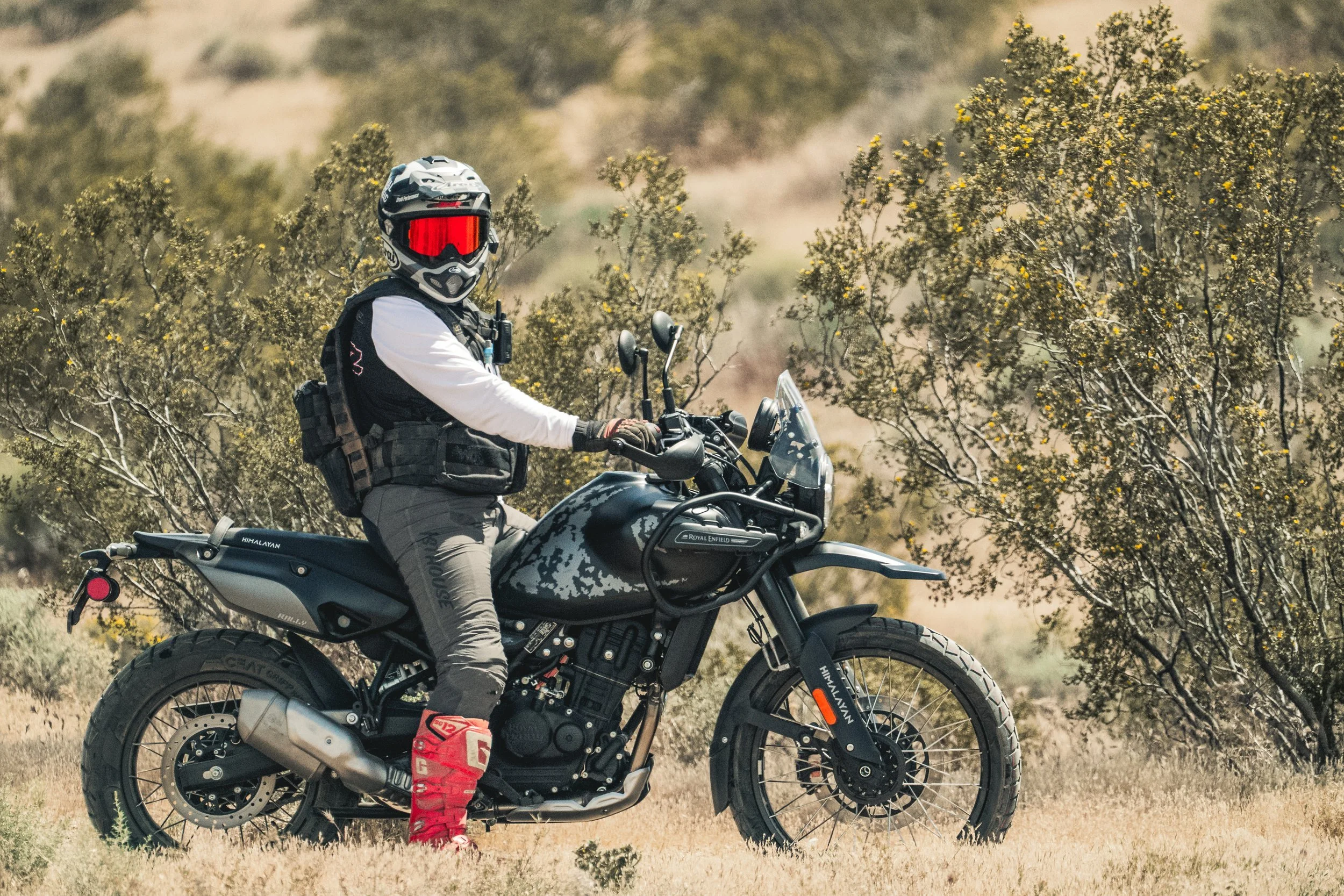Rider on a Royal Enfield Himalayan 450 Mana Black in the desert