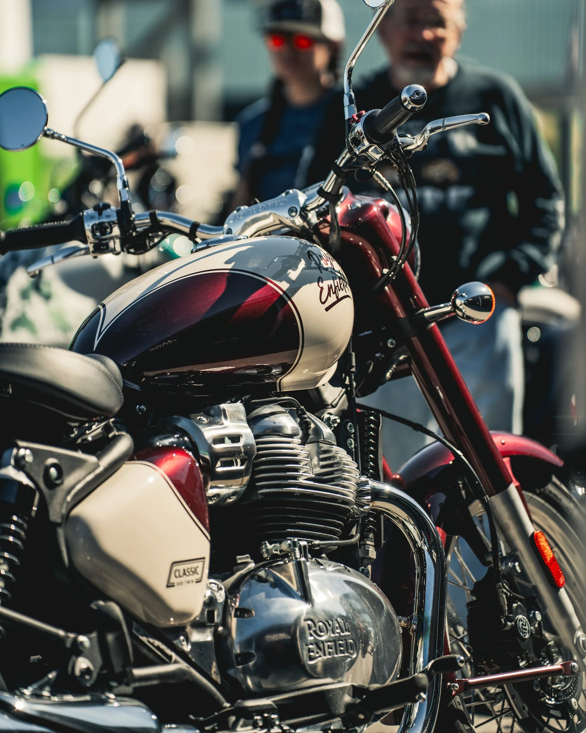 Close-up of a red Royal Enfield motorcycle tank at Daytona 2026