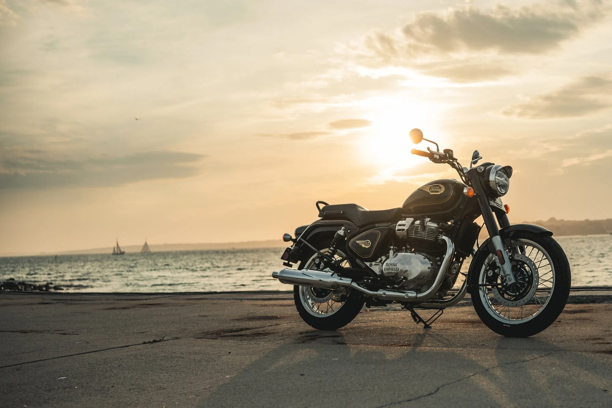 Royal Enfield Bullet 650 silhouetted against a sunset, photographed by Fast Glass Media
