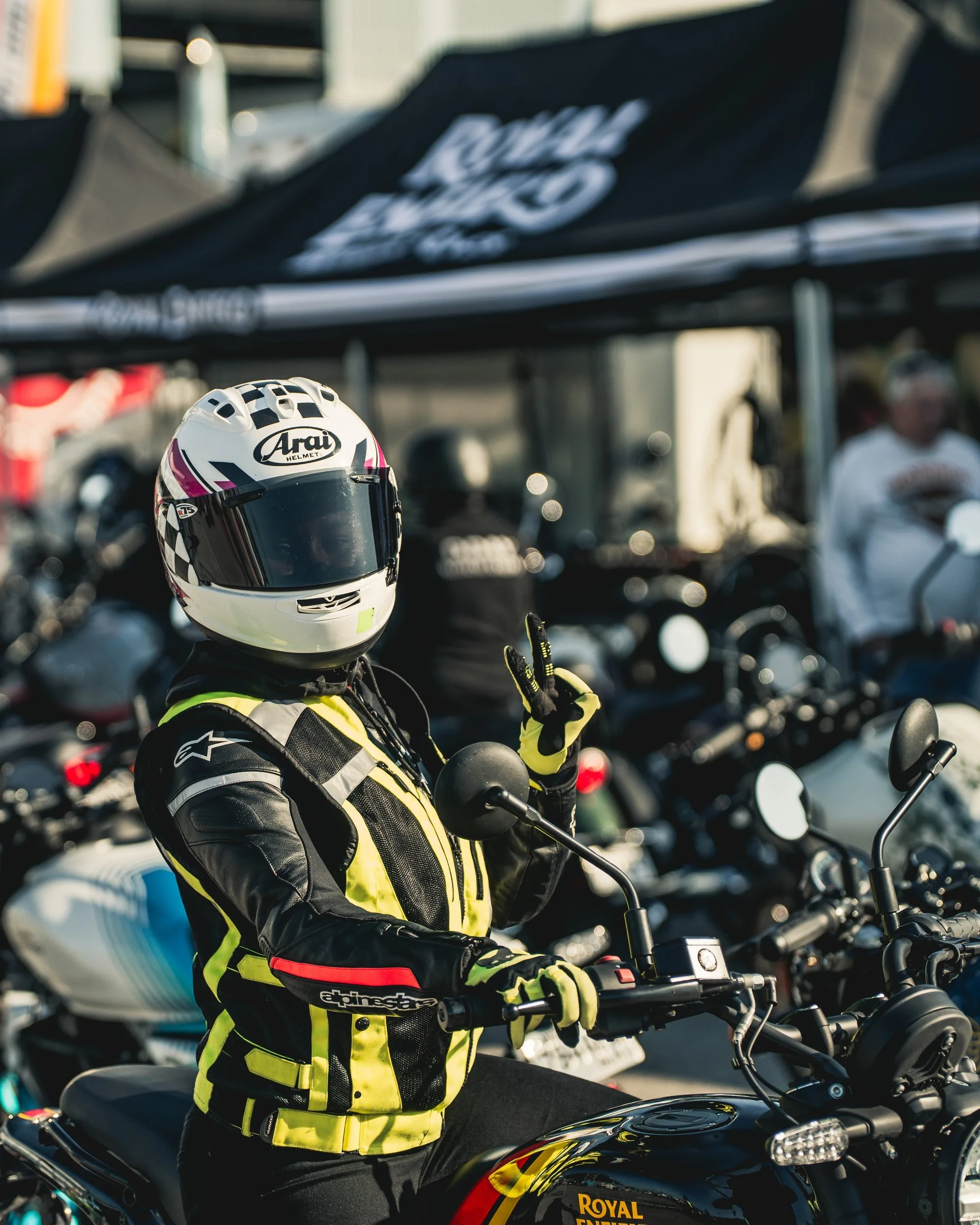 Rider in an Arai helmet at the Royal Enfield stand at Daytona 2026